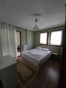 Postel nebo postele na pokoji v ubytování Jasmin Apart Otel