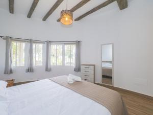 Giường trong phòng chung tại Cubo's Casa El Candil 8 PAX +38 ảnh