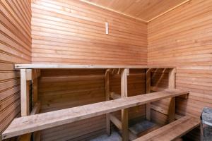 an inside of a sauna with a bench in it at Staicele - Learning and Training Hub in Staicele