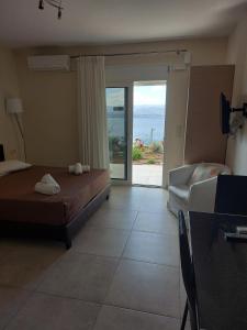 Postel nebo postele na pokoji v ubytování Aegean View Villa
