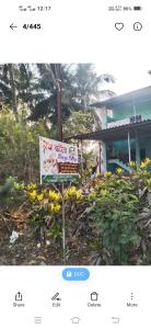 a screenshot of a sign in front of a building at Shreya Cottage, Vaishet-Alibag in Vaishet +4 photos