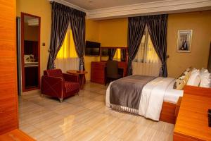 A bed or beds in a room at Otk's Apartment