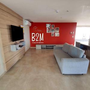 Μια τηλεόραση ή/και κέντρο ψυχαγωγίας στο Vila Açoriana Confort club, pé na areia