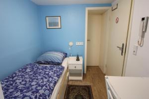 Postel nebo postele na pokoji v ubytování Kleine Wohnung für Singles