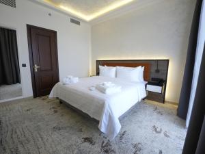 Postel nebo postele na pokoji v ubytování Eighty Eight Deluxe Hotel & Spa