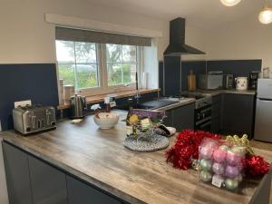 Kuchyň nebo kuchyňský kout v ubytování Plain Street Cottage