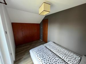 Posteľ alebo postele v izbe v ubytovaní MIHI APARTMAN