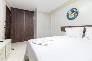 Postel nebo postele na pokoji v ubytování Apto pé na areia, com vista para o mar! - Destino BSM 213 + 50 fotografií