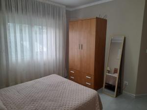 Ένα ή περισσότερα κρεβάτια σε δωμάτιο στο Apartamento Sanchola