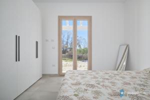 ブドーニにあるResidence budoni 650 M spiaggia by budoniaffittiのギャラリーの写真 +34枚の写真