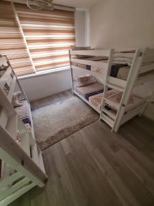 Postel nebo postele na pokoji v ubytování DM Hostel and Apartments
