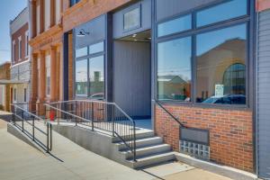 a building with a staircase outside of a store at Cashton Studio Apartment Steps to Downtown! 