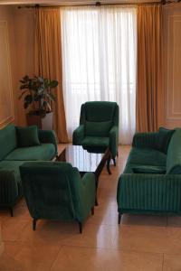 A seating area at Marionn Hotel
