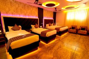 Aman Homestay, A Boutique Hotel客房内的一张或多张床位