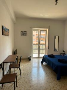 Postel nebo postele na pokoji v ubytování Palm Rooms