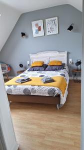 Katil atau katil-katil dalam bilik di Gîte la passerelle