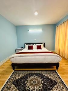 Postel nebo postele na pokoji v ubytování PS Boutique Hotel