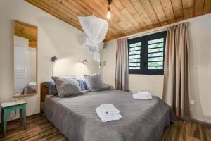 Postel nebo postele na pokoji v ubytování Latitude 14.54 + 36 fotografií