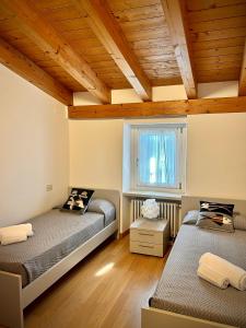 Ένα ή περισσότερα κρεβάτια σε δωμάτιο στο Villa Borgo Borago