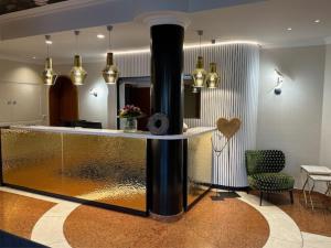TV a/nebo společenská místnost v ubytování Hotel Astoria - Alexandra Krämer eK