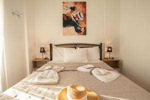 Postel nebo postele na pokoji v ubytování Afrathias Beachhouse - Cretan Hideaway