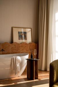 Postel nebo postele na pokoji v ubytování Zinar Castle