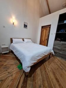 Cama o camas de una habitación en Kichaka Cottages