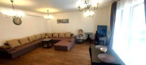 Posezení v ubytování Predeal Escape Apartment