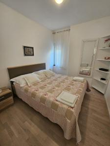 Postel nebo postele na pokoji v ubytování Apartment Marija