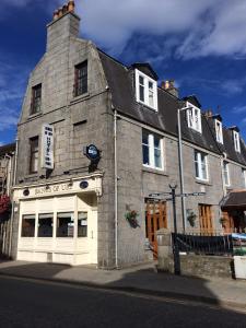 a building on the corner of a street at Banks Of Ury in Inverurie