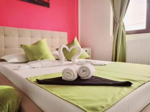 Ένα ή περισσότερα κρεβάτια σε δωμάτιο στο Vila Clara