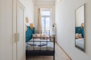 Posteľ alebo postele v izbe v ubytovaní Gellerico Rooms at Rákóczi Square