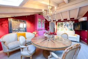 Μια τηλεόραση ή/και κέντρο ψυχαγωγίας στο Castello Luxury Apartments - Rosa