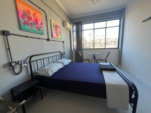 Posteľ alebo postele v izbe v ubytovaní Urban Rooms