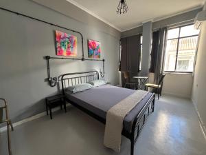 Posteľ alebo postele v izbe v ubytovaní Urban Rooms