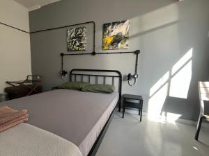 Posteľ alebo postele v izbe v ubytovaní Urban Rooms