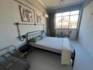 Posteľ alebo postele v izbe v ubytovaní Urban Rooms
