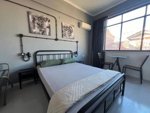 Posteľ alebo postele v izbe v ubytovaní Urban Rooms