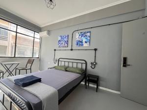 Posteľ alebo postele v izbe v ubytovaní Urban Rooms