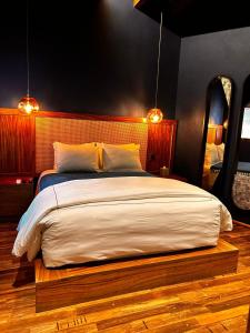 Postel nebo postele na pokoji v ubytování Bito's Hotel Boutique