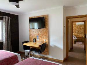 Uma cama ou camas num quarto em Casa Carvalhal - Adults Only