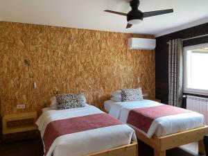 Uma cama ou camas num quarto em Casa Carvalhal - Adults Only