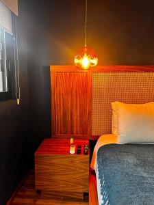 Postel nebo postele na pokoji v ubytování Bito's Hotel Boutique
