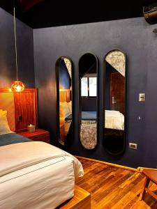 Postel nebo postele na pokoji v ubytování Bito's Hotel Boutique