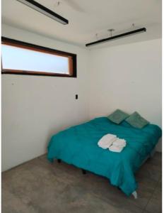 En eller flere senge i et værelse på Apartamento Loft Centrico Amecameca