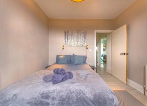 Postel nebo postele na pokoji v ubytování Botanic Rooms