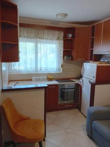 Kuchyň nebo kuchyňský kout v ubytování Luna Apartman