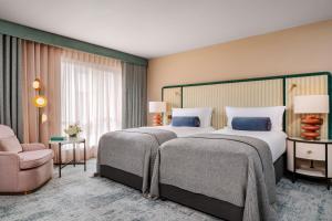 Ein Bett oder Betten in einem Zimmer der Unterkunft The Green