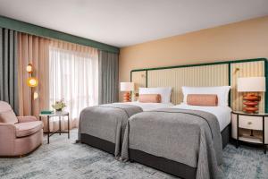 Ein Bett oder Betten in einem Zimmer der Unterkunft The Green