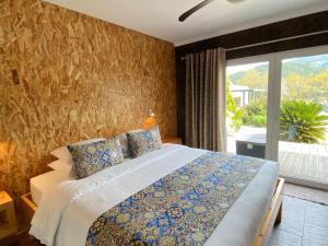 Uma cama ou camas num quarto em Casa Carvalhal - Adults Only
